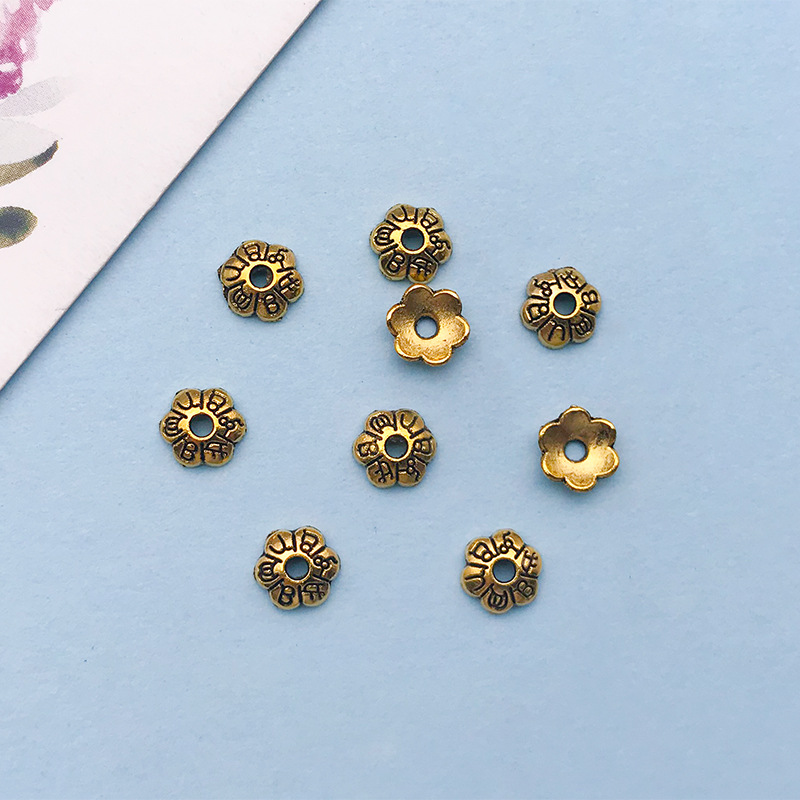 7:1 antique gold flower-shaped flower hat 5*5 holes 1.1 mm-16607-0.1g