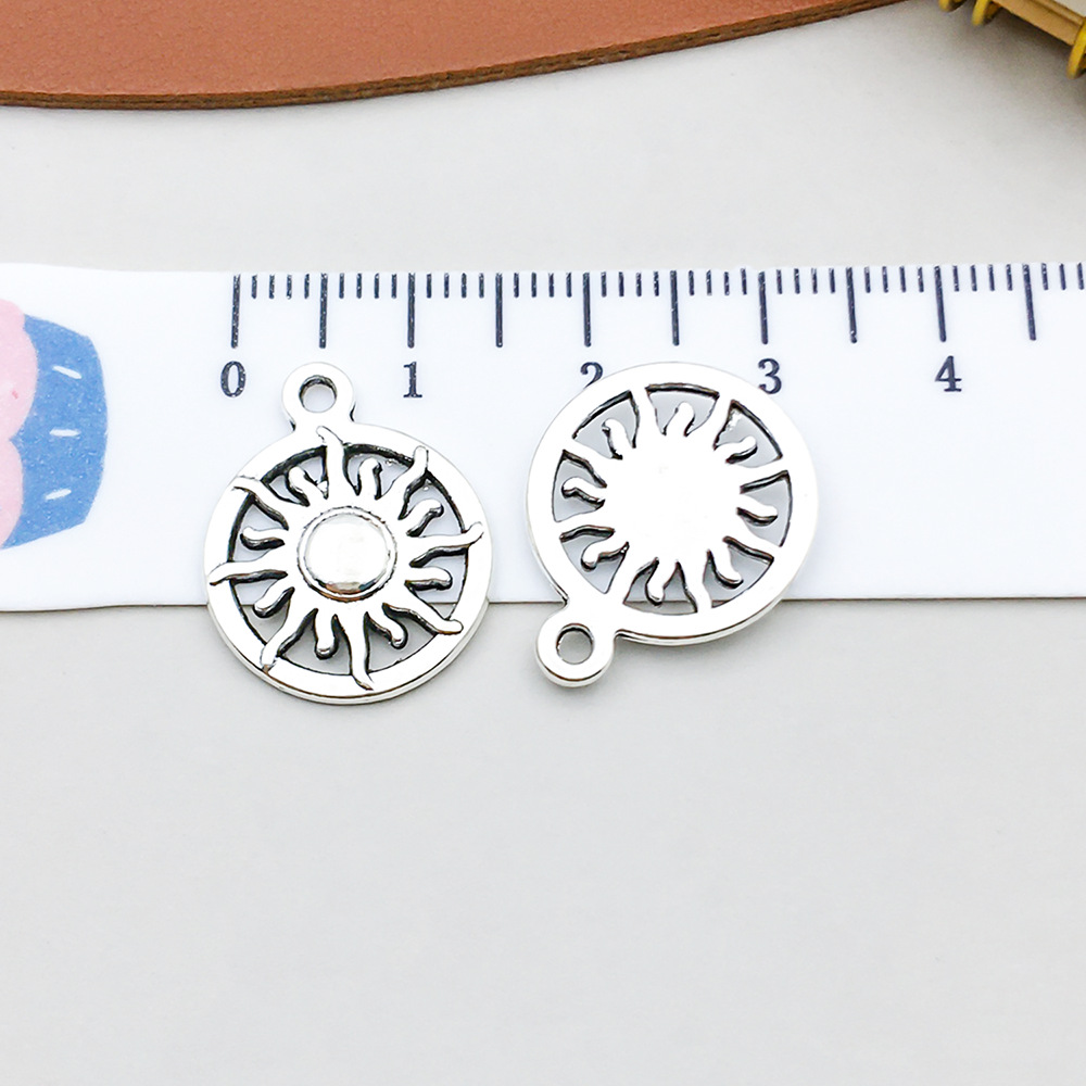 9:1 antique silver sun 16*19mm-1.4g-8230