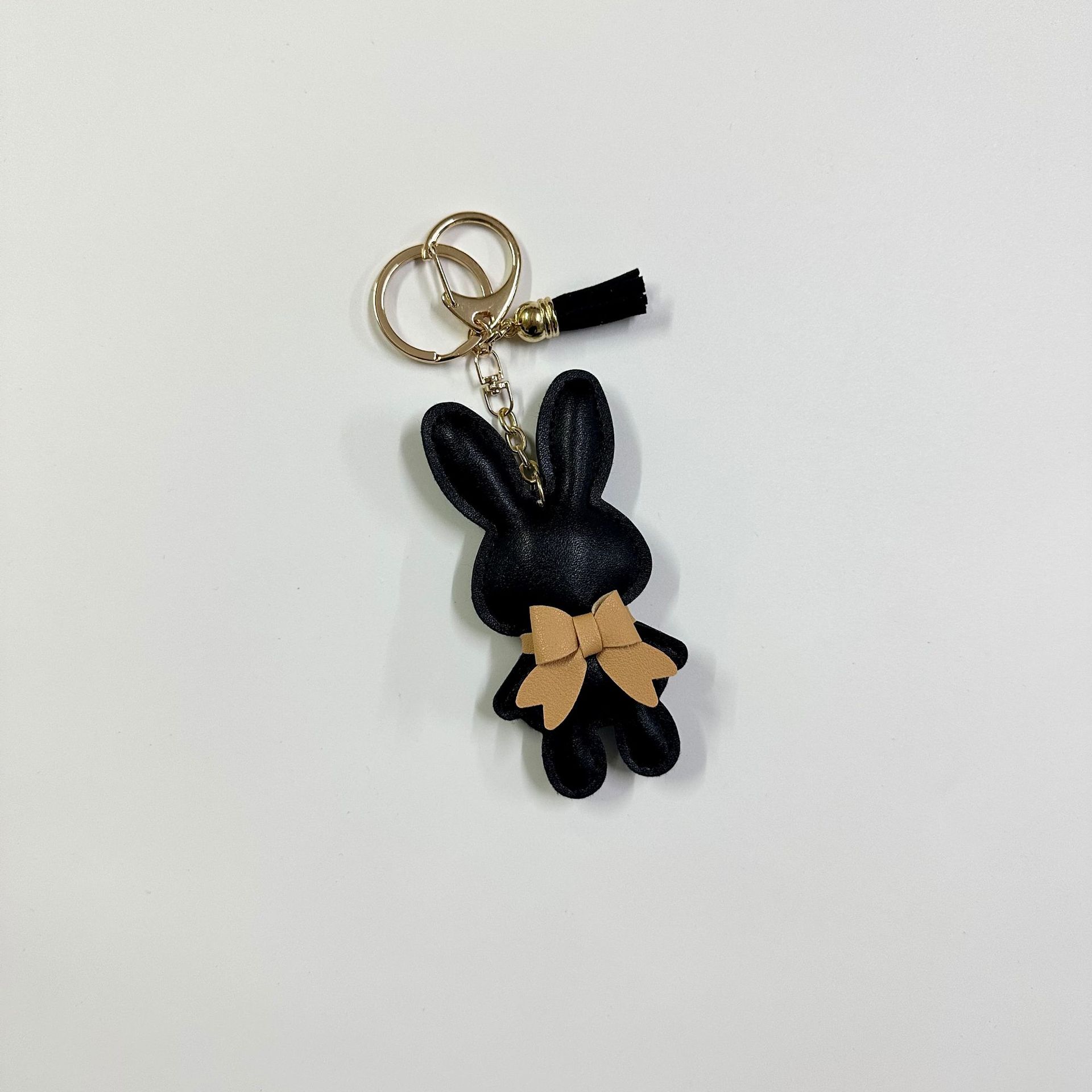 9:Black Rabbit with Button Tassel