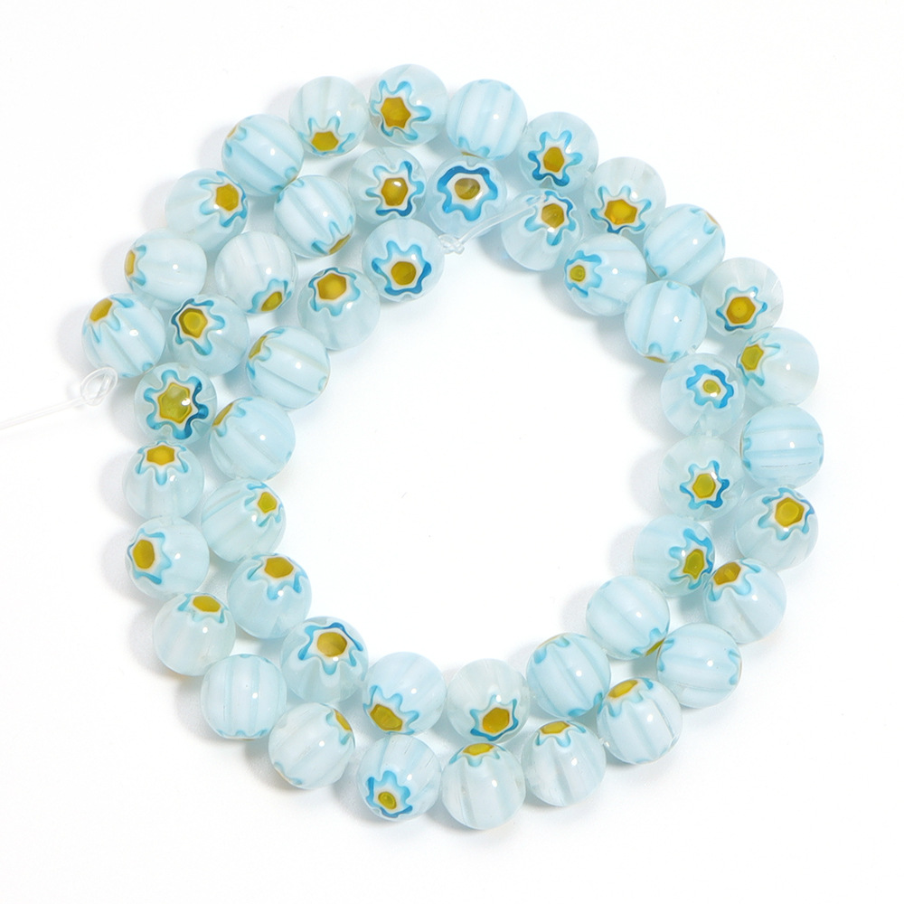 Light blue yellow flower 6mm aperture about 1mm (a