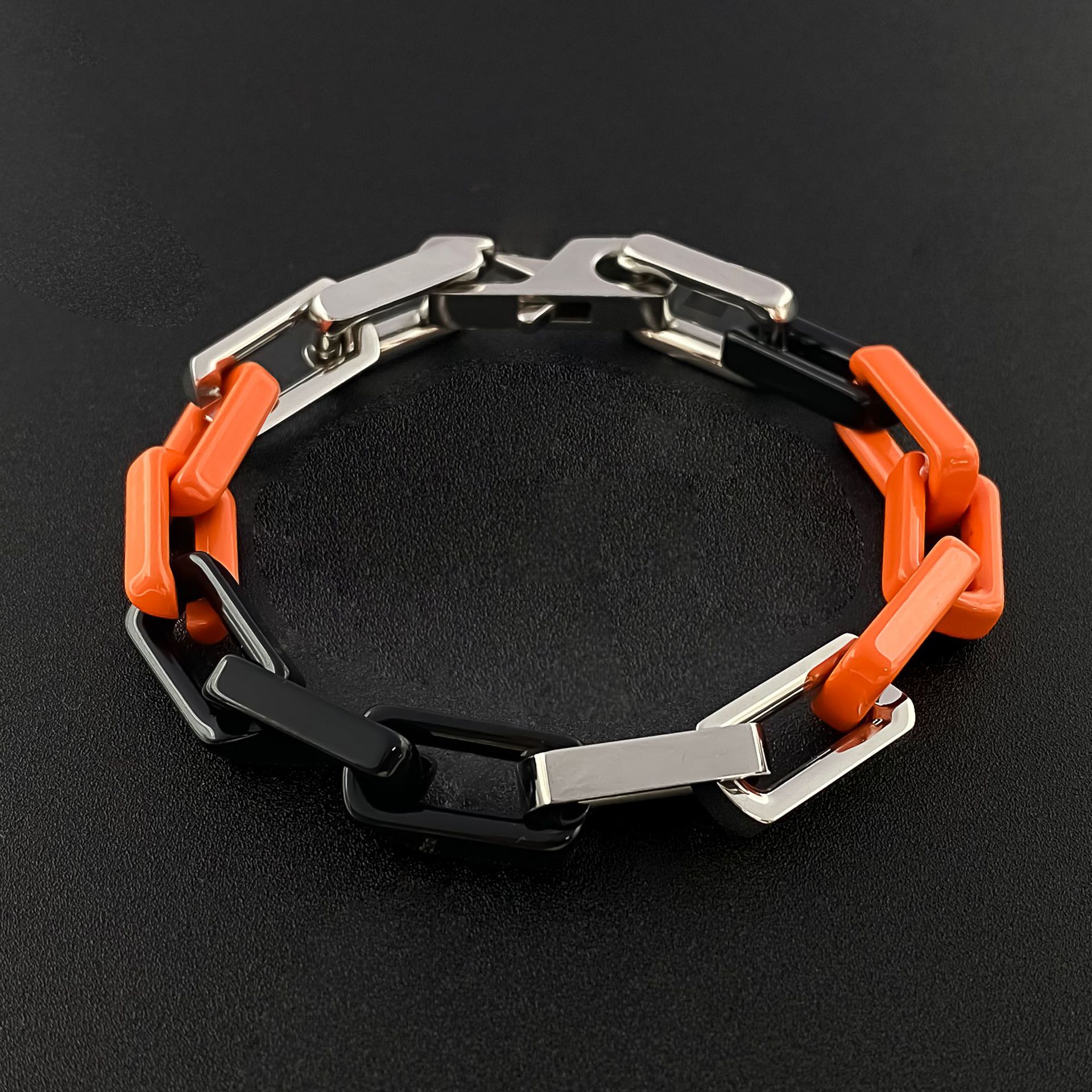 Orange and black steel bracelet 18cm
