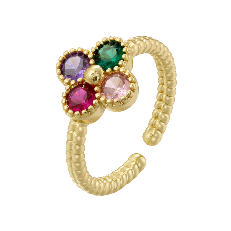 6:Gold colored diamond twist edge four-leaf clover ring