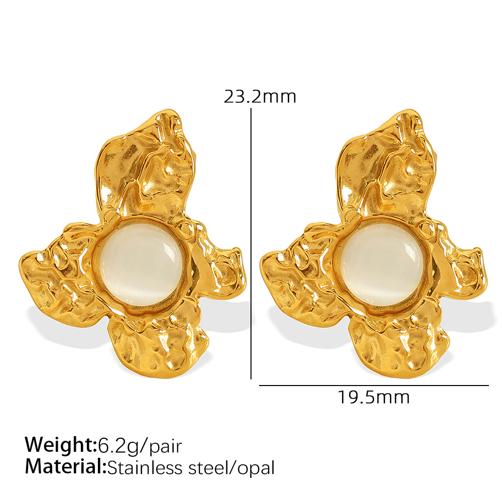 1:EH653 white cat's eye gold earrings