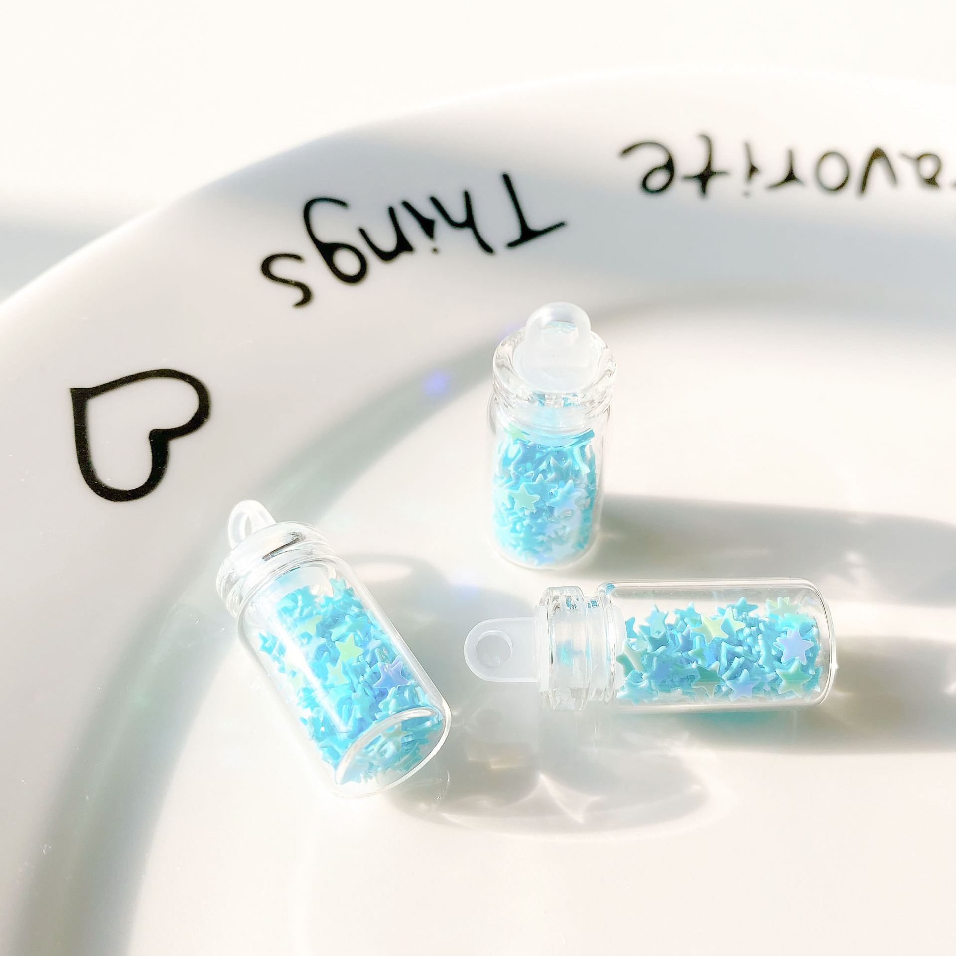 7:Sky blue five-pointed star sequin glass bottle pendant