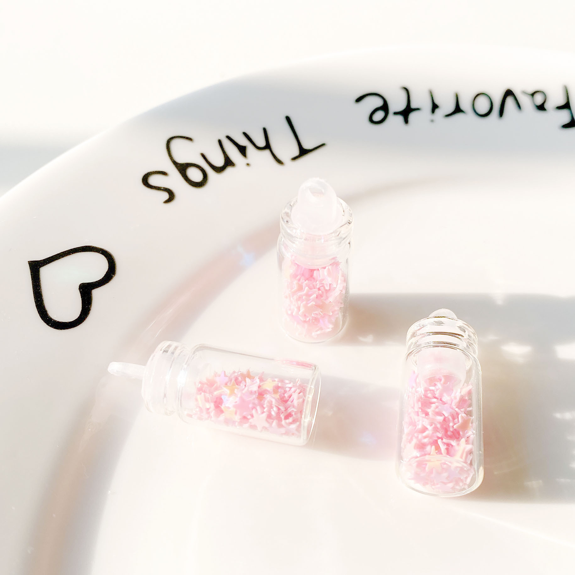 9:Pink five-pointed star sequin glass bottle pendant