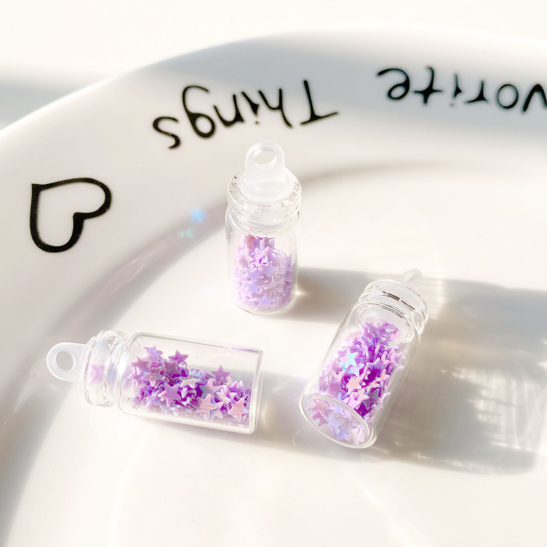 10:Purple five-pointed star sequin glass bottle pendant