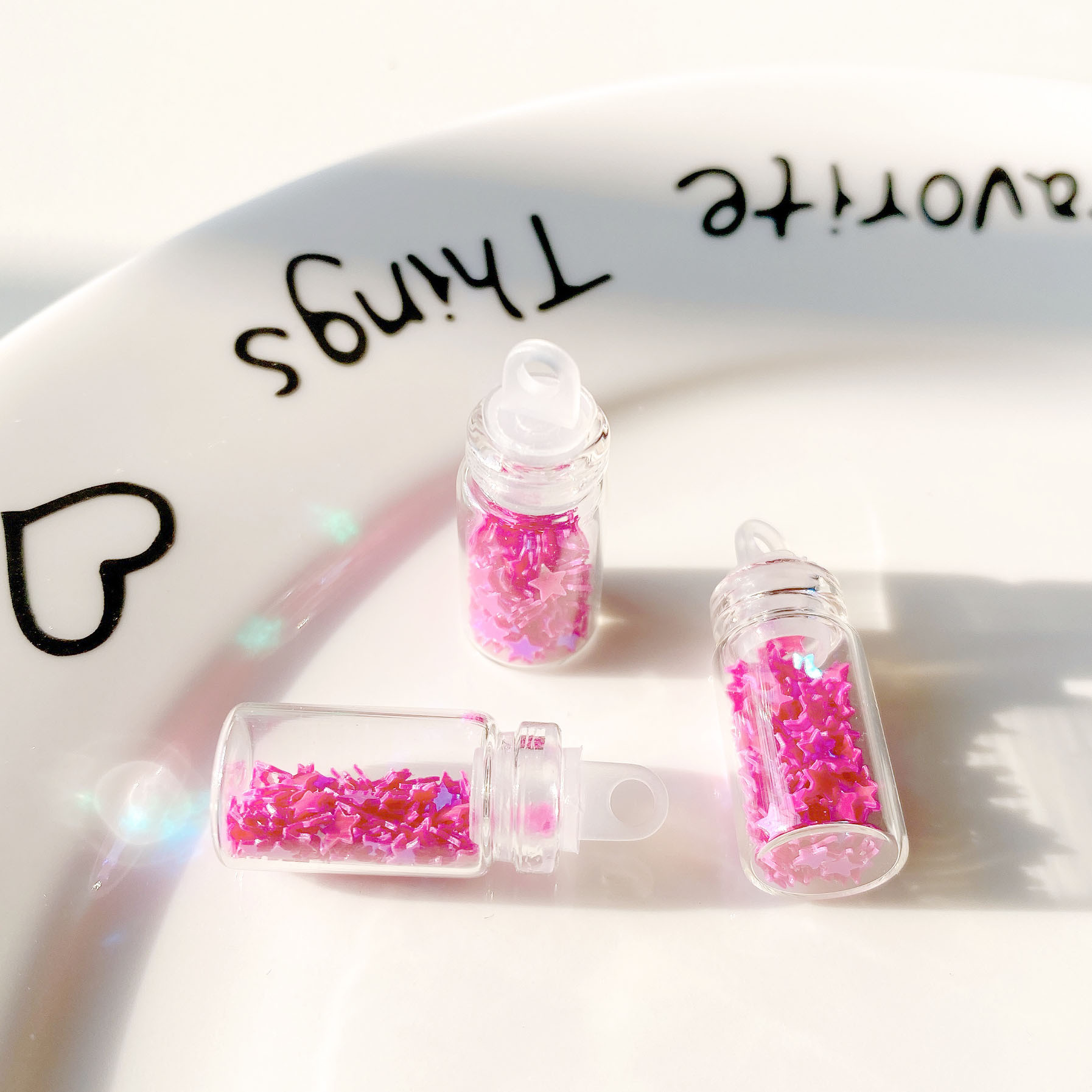 11:Rose red five-pointed star sequin glass bottle pendant