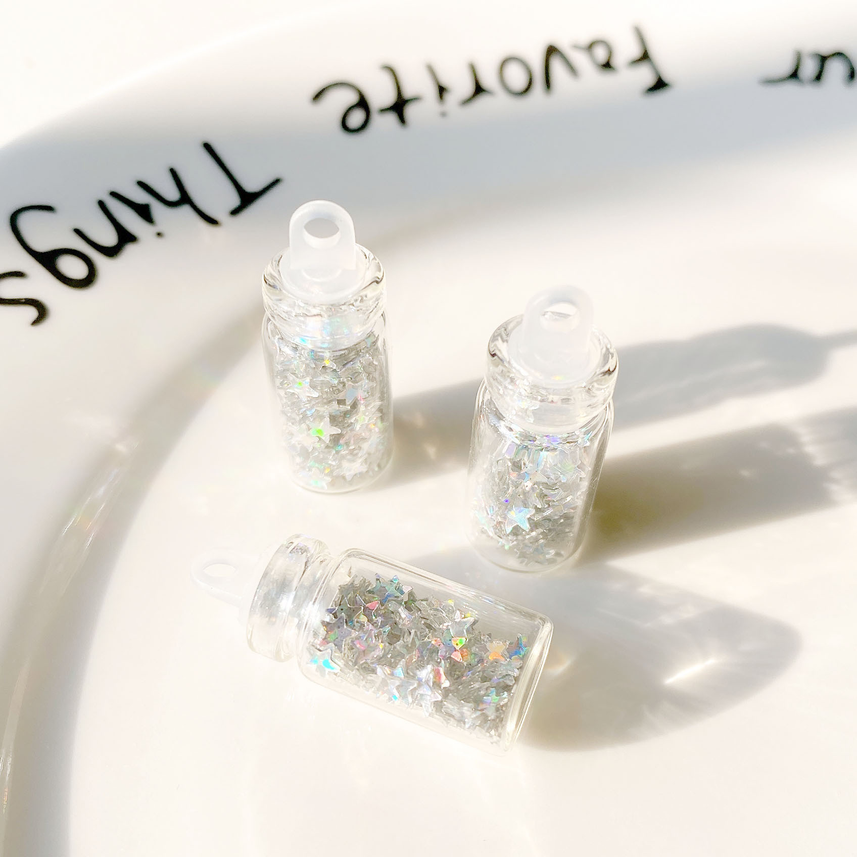 12:Silver five-pointed star sequin glass bottle pendant