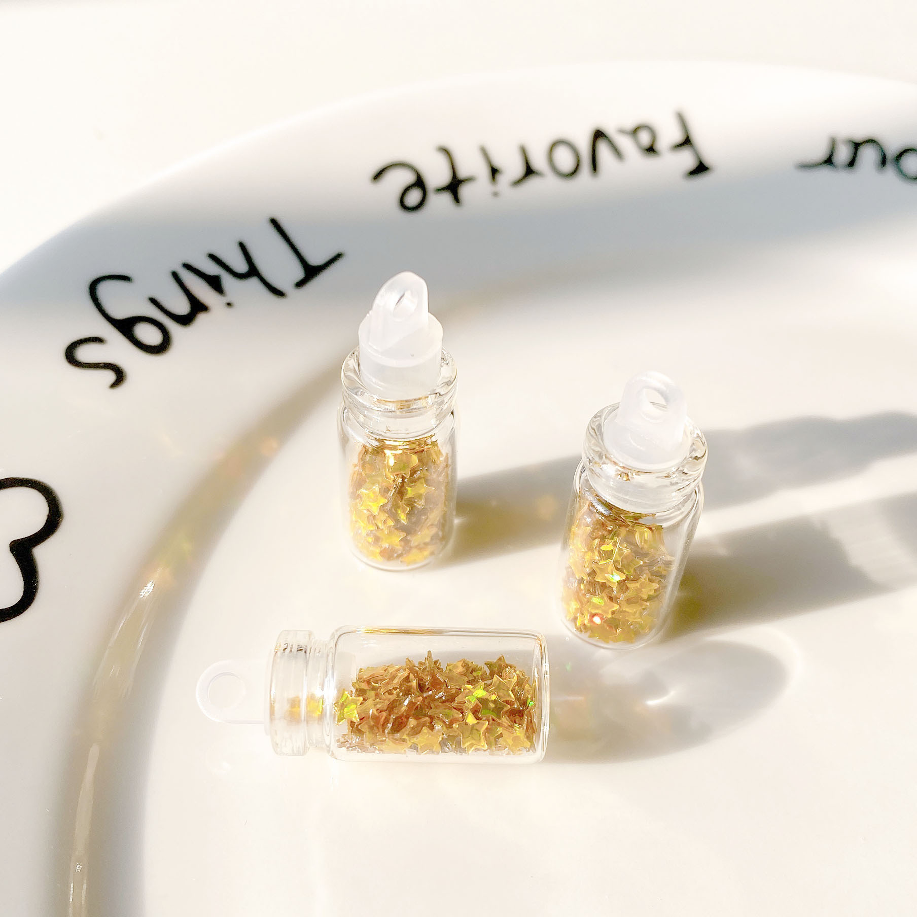 13:Golden five-pointed star sequin glass bottle pendant