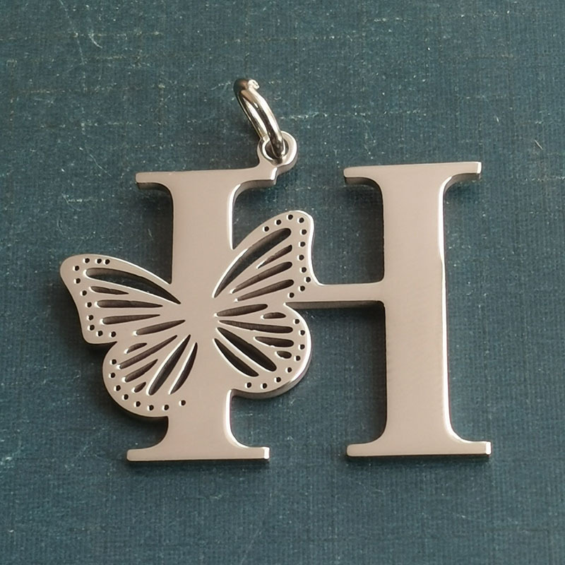8:H silver pendant