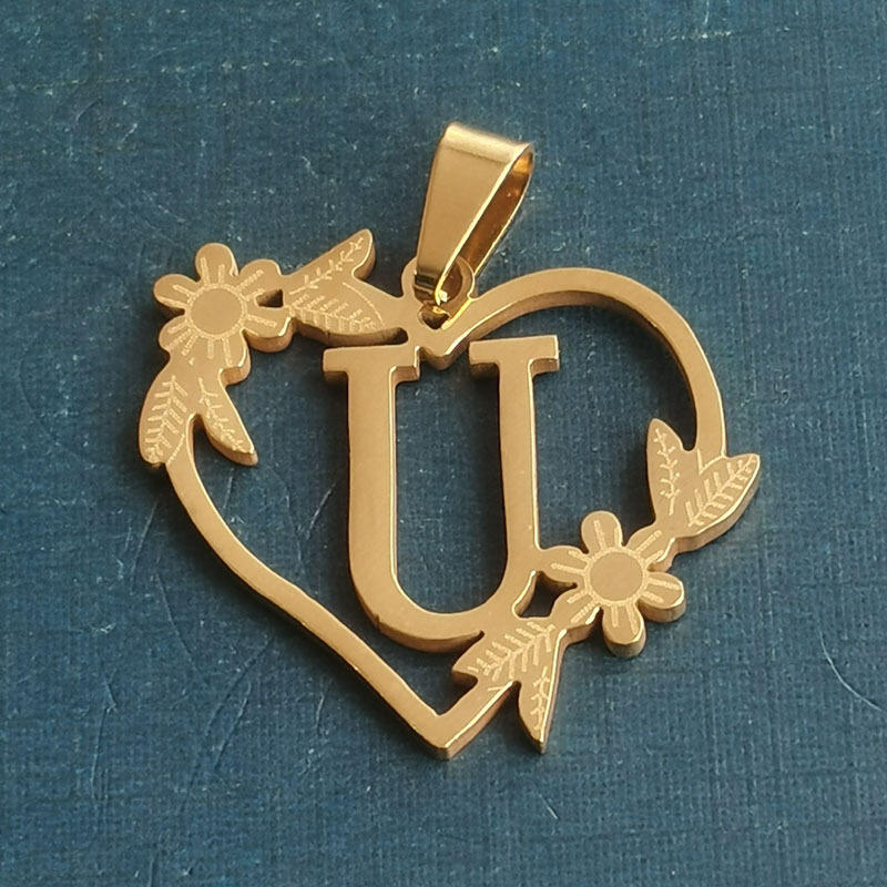 47:U gold pendant