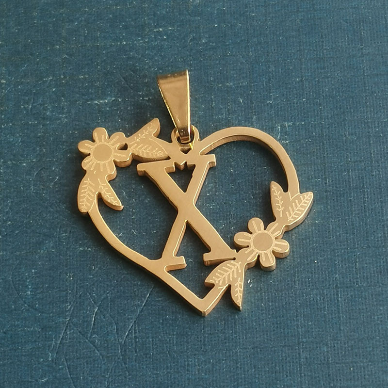50:X gold pendant