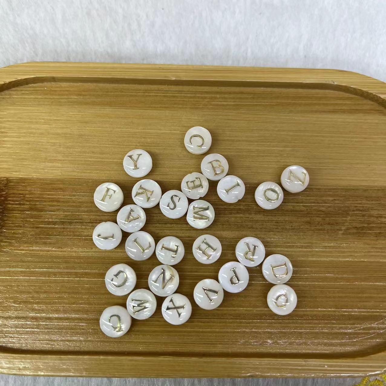 1:Gold letters on white background (one bag of 26 letters)