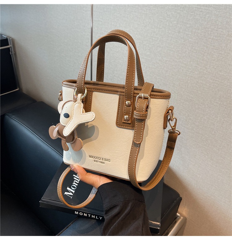 White with brown belt pendant