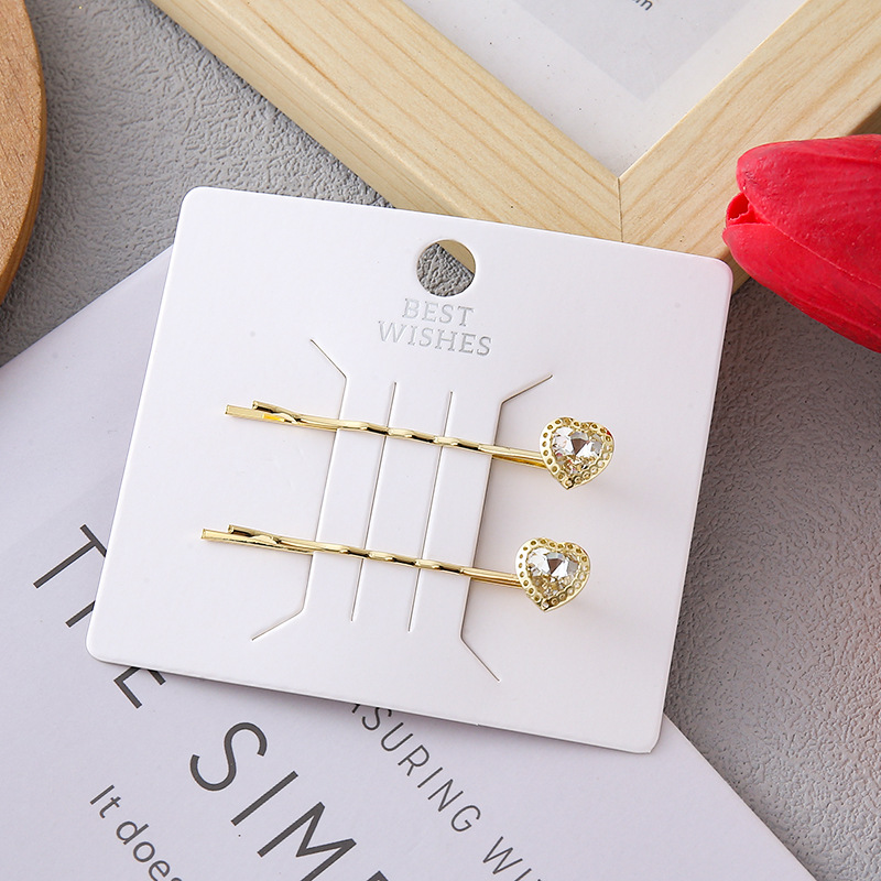 3:pair of golden hearts