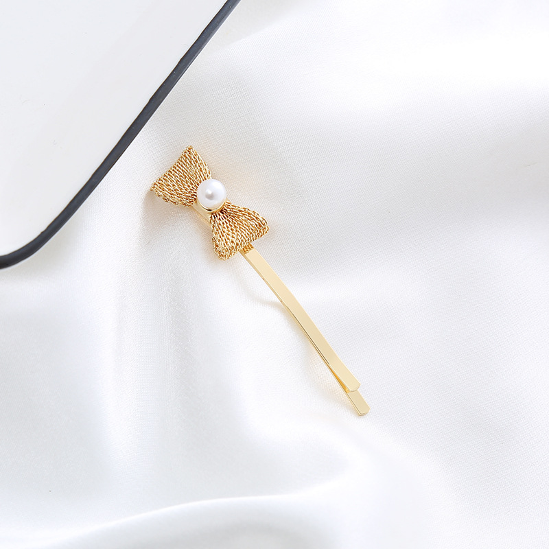 11:Bow tie mesh pearl clip