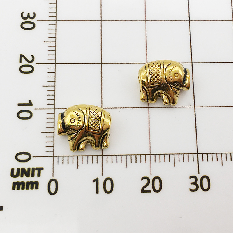 2:10136-antique golden elephant-9x11-1.5mm