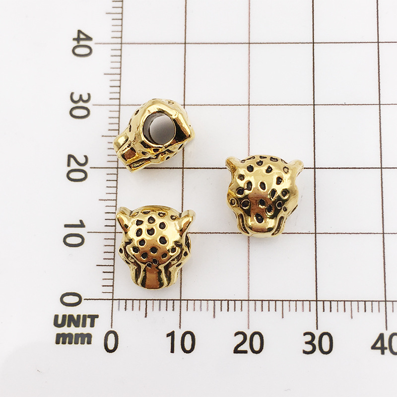 4:10115-antique gold leopard head-10x12-4mm