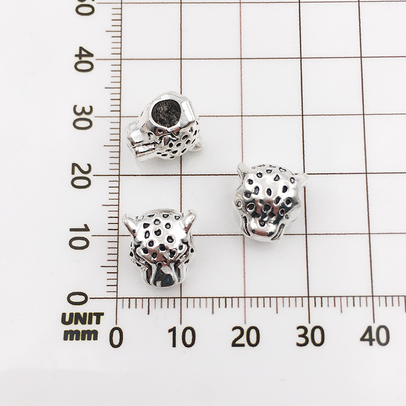 5:10116-antique silver leopard head-10x12-4mm