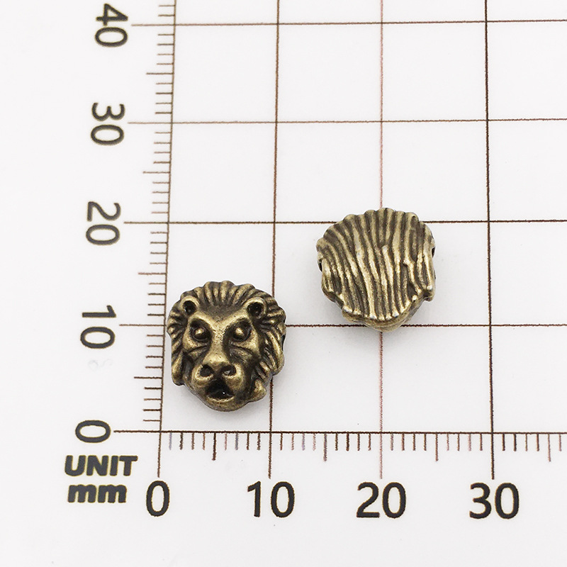 6:10117-antique  Bronze Lion Head-10x12-1.5mm