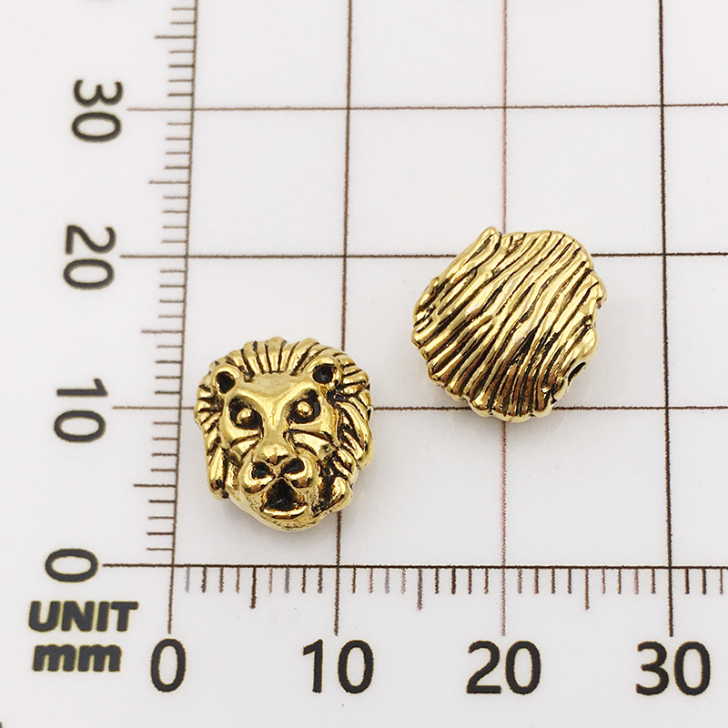 7:10118-antique gold lion head-10x12-1.5mm