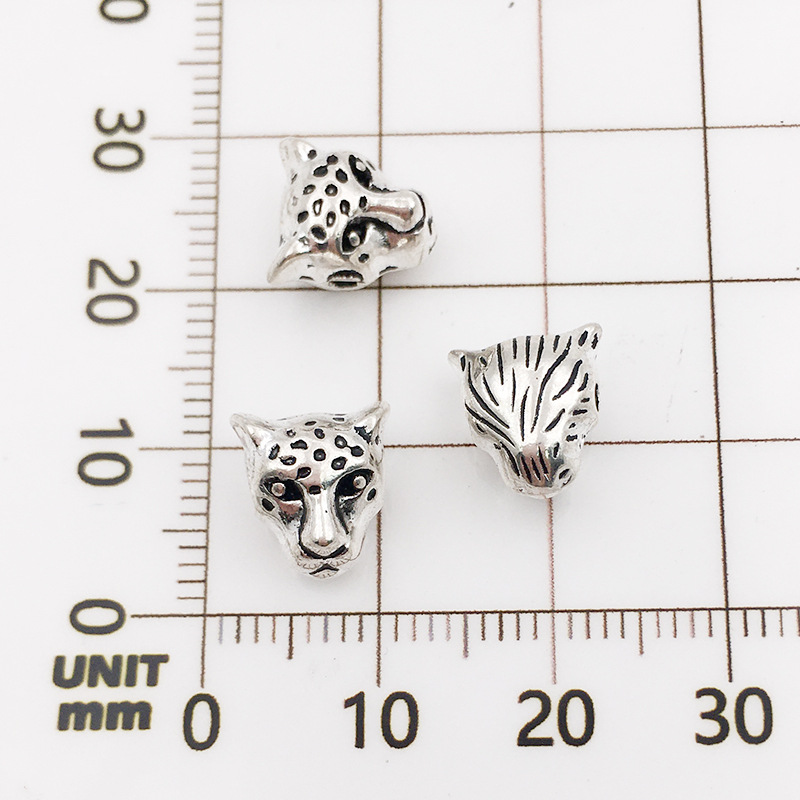 11:10122-antique silver leopard head-9x10-1.5mm
