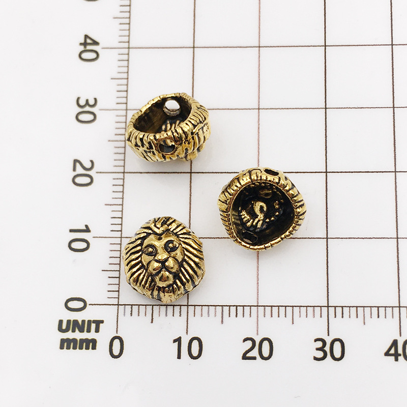 13:10127-antique  gold lion head-12x12-1.5mm