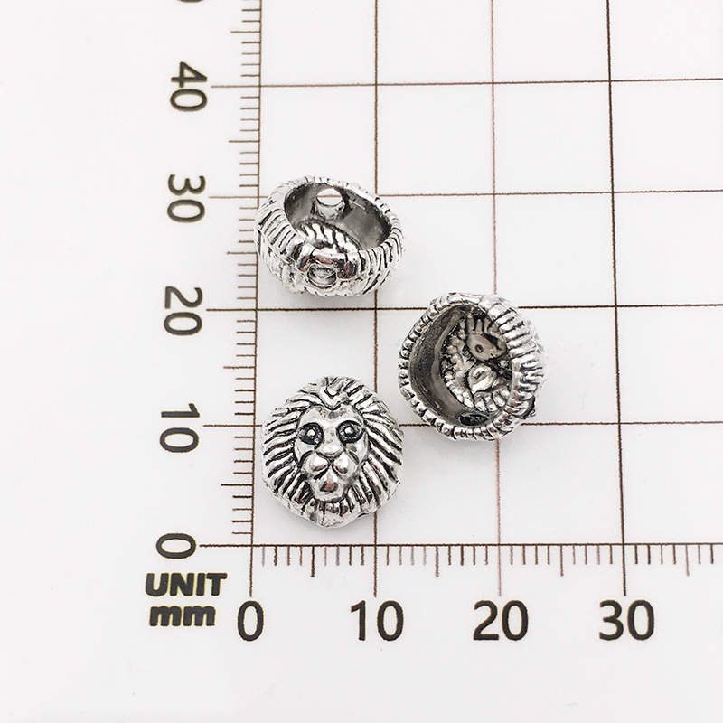 14:10128-antique silver lion head-12x12-1.5mm