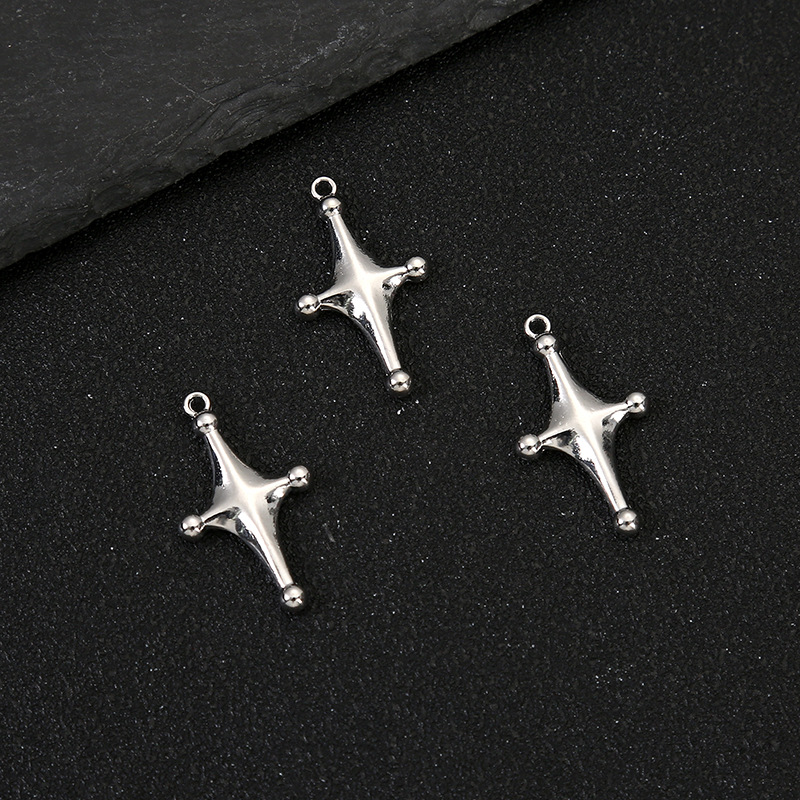 4:Cross star (about length: 3cm width: 1.7cm thickness: 0.3cm)