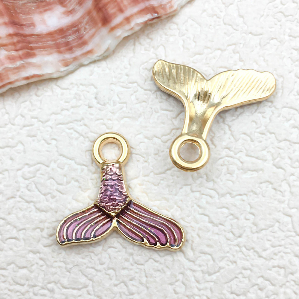 1 mermaid tail 14x15mm-0.7g-10970