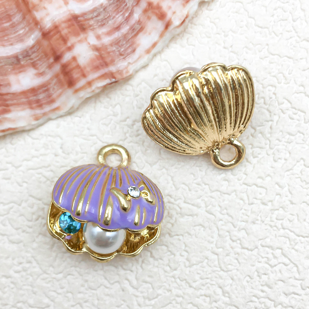 1 diamond-encrusted pearl fan shell 16x17mm-3g-180