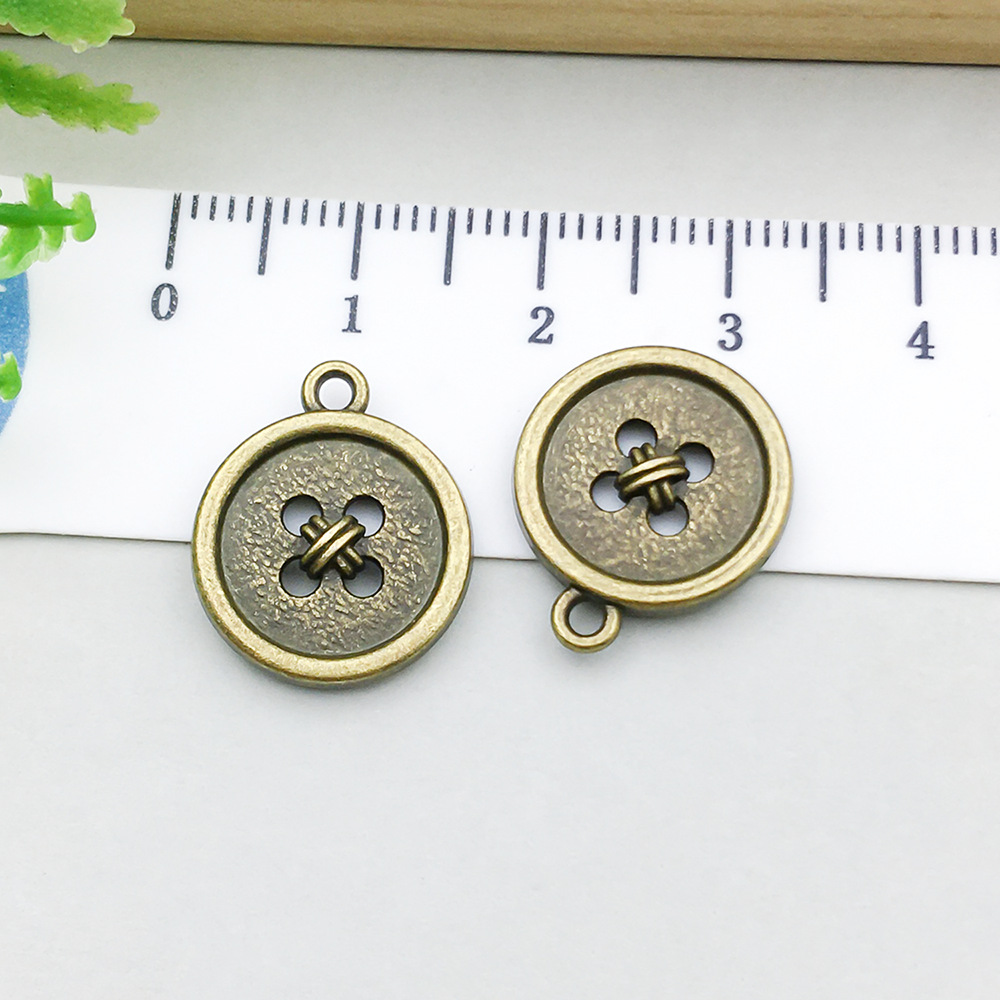 19:antique bronze button 14*17mm-1.4g-20280