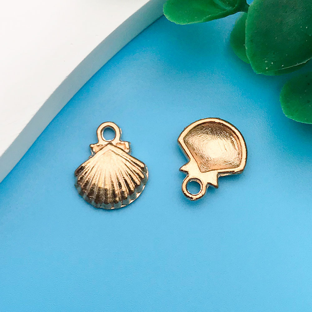 1 kc gold ocean small shell 12x14mm-11599-0.9g