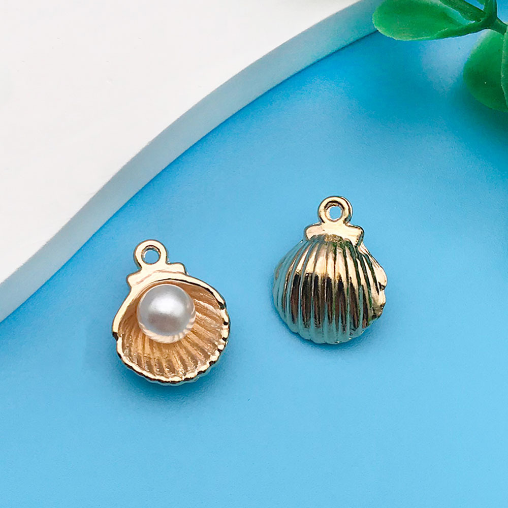 7:kc Gold Drop Oil Marine Pearl Shell 12x15mm-11948-1.1g