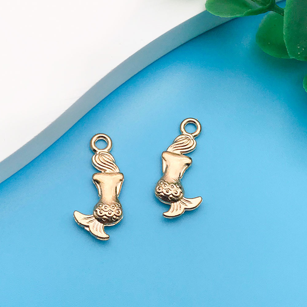 14:kc Gold Ocean Mermaid 9x 20.5mm-18267-0.7g