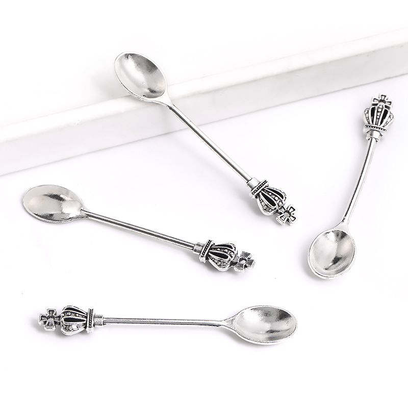2:antique silver spoon