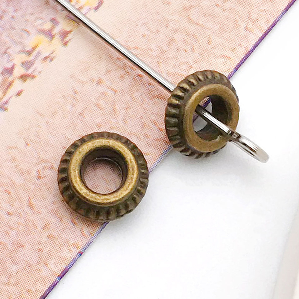 antique bronze round panjia spacer bead 7x 7 hole