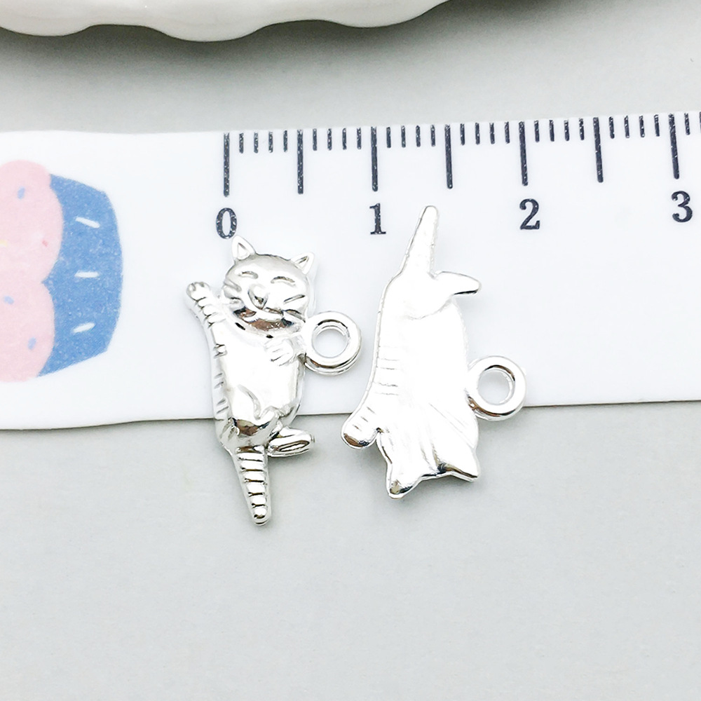 1 bright silver raised cat 19*11mm-1.1g-20642