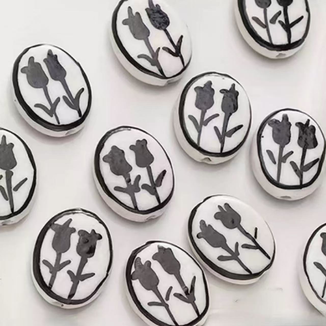 1 large black double flower oval