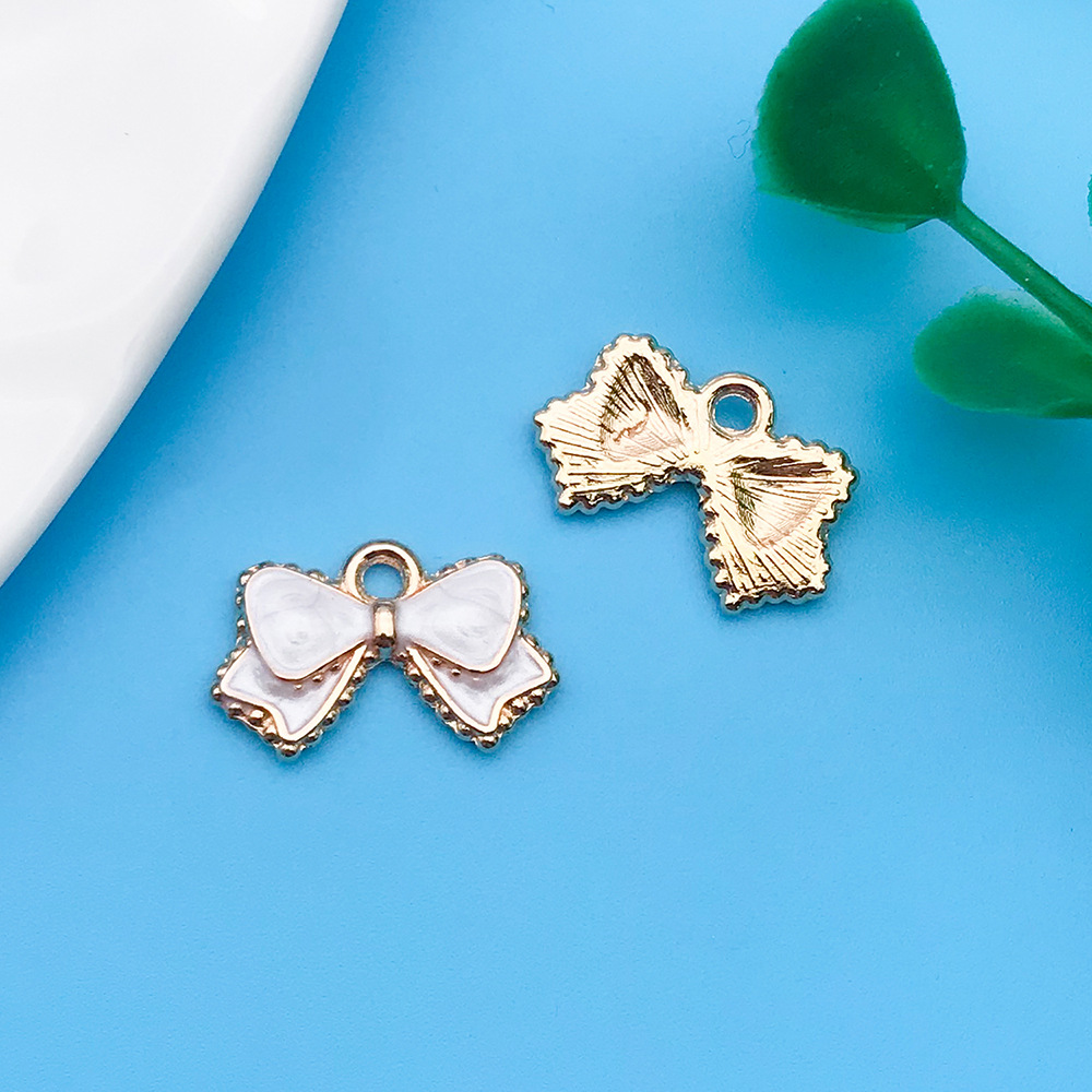 16:Oil dripping white bow 15.5x 10mm-12250-0.8g