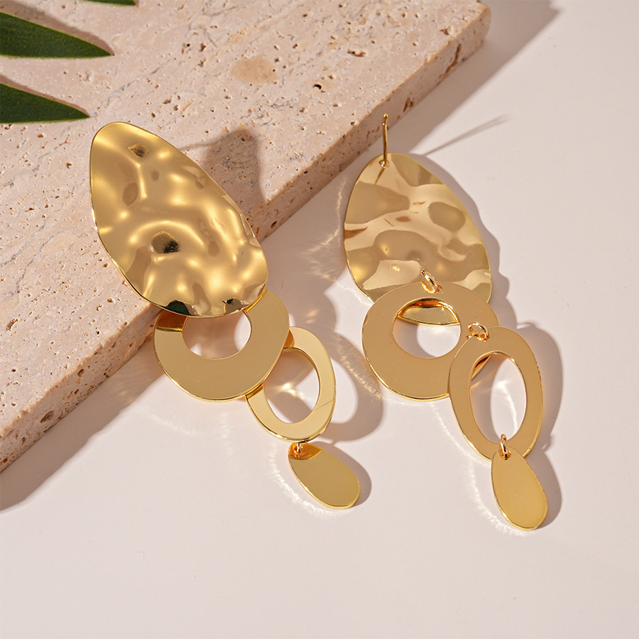 1:Silver needle-golden oval water drop earrings