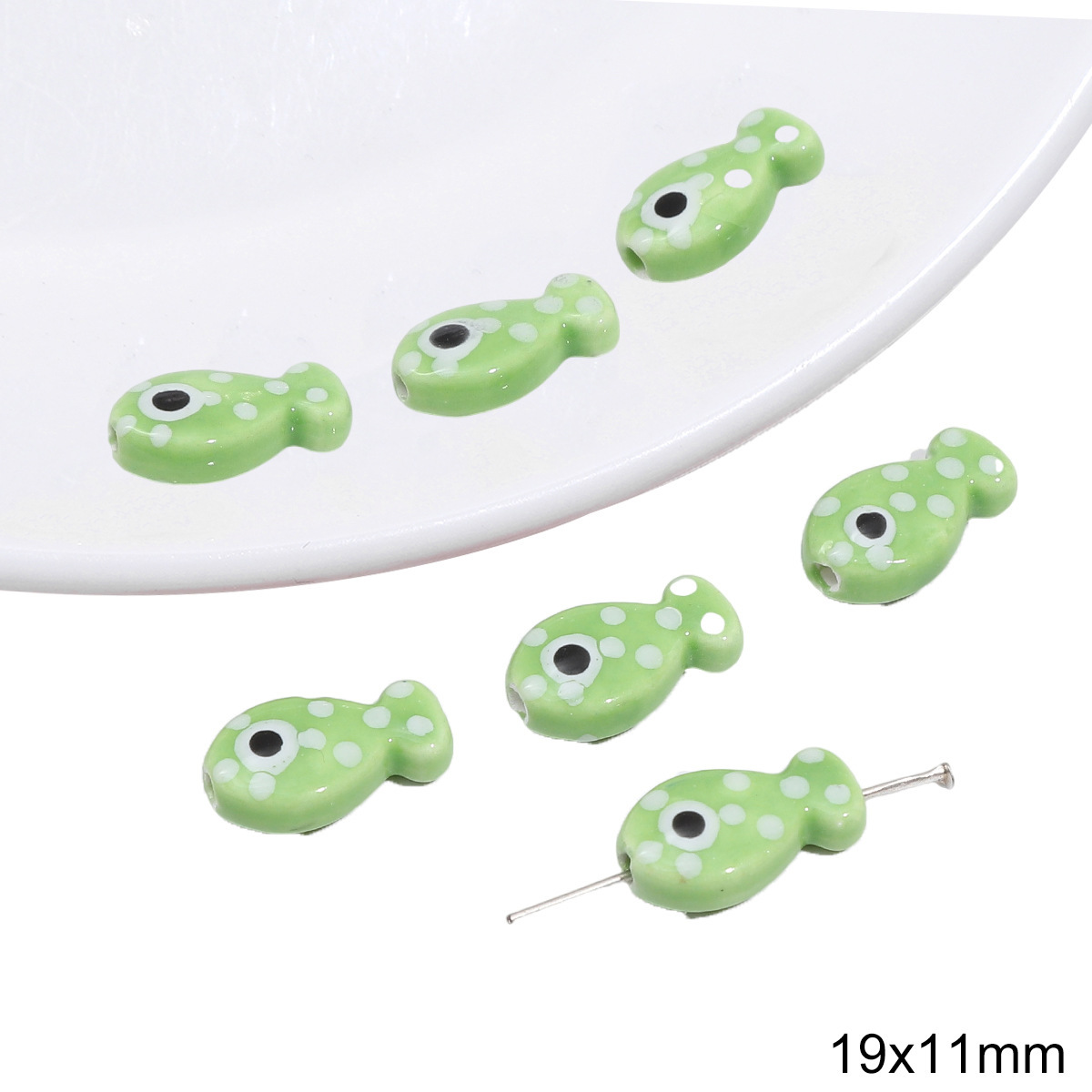 20:Spotted small fish 19x 11mm 2/bag