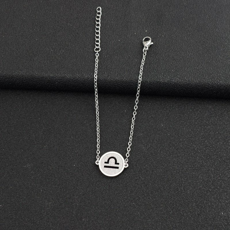 9:One steel Libra bracelet