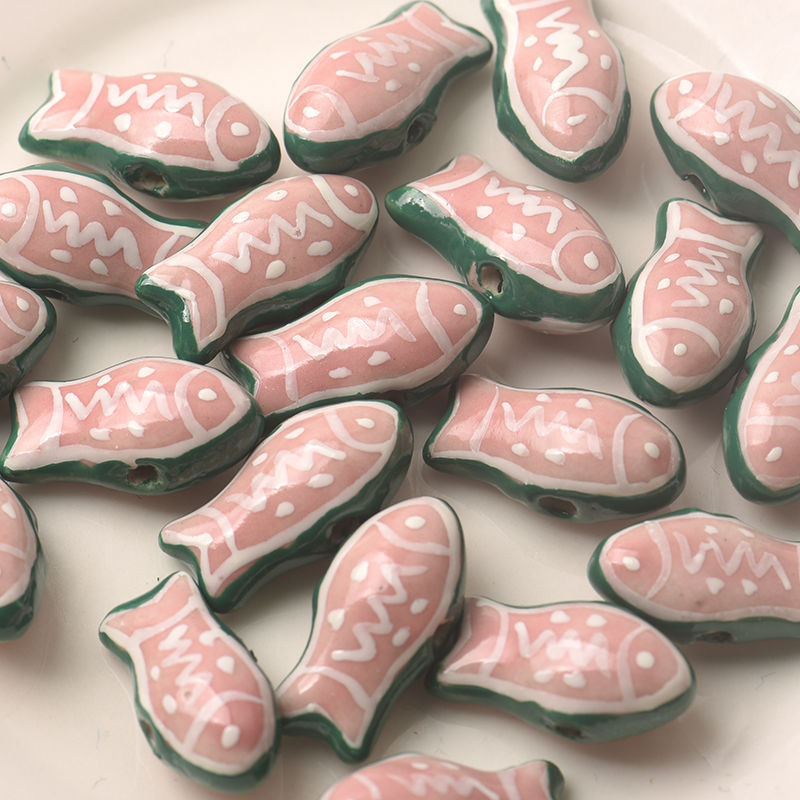 3:A small pink and green fish