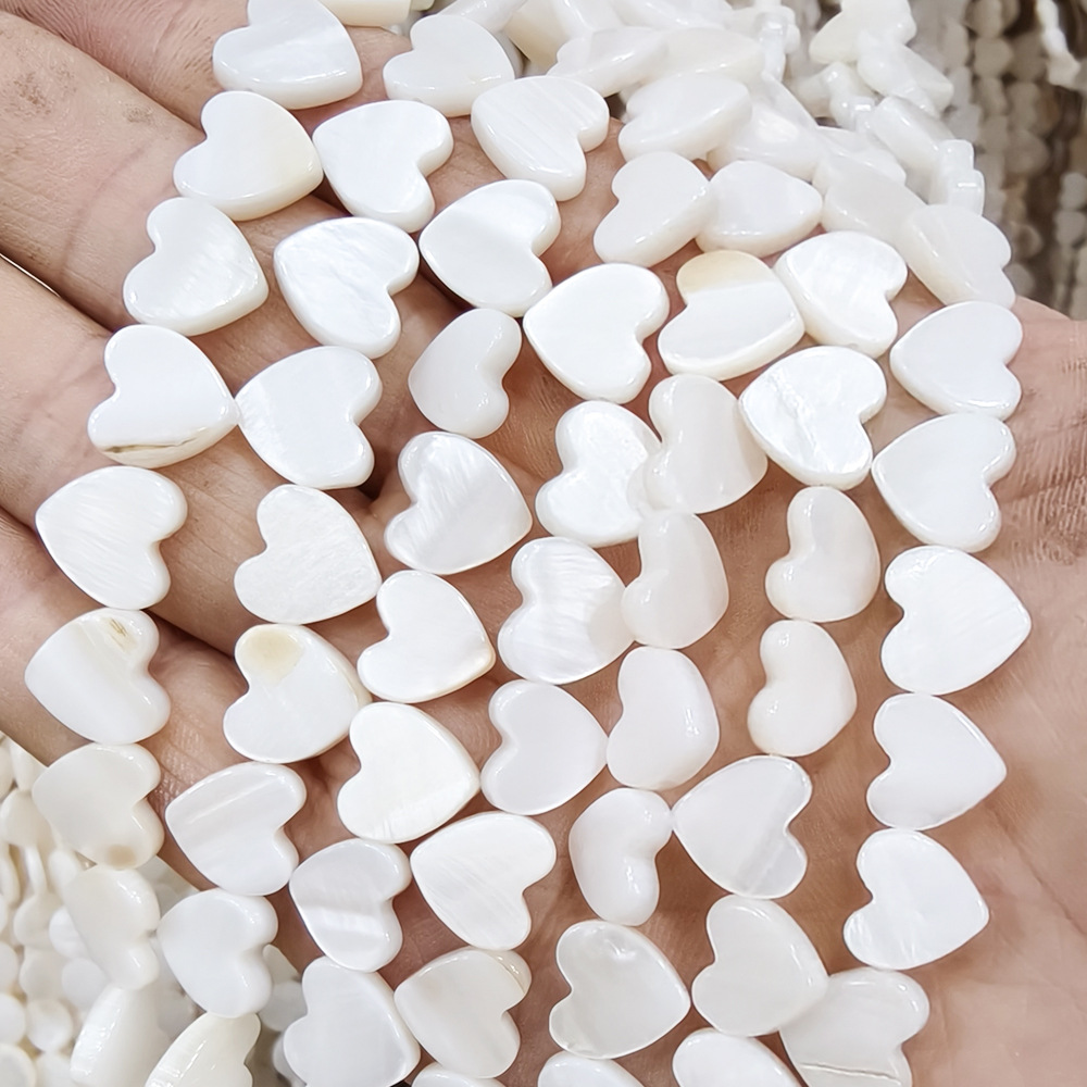 Heart center hole 8mm/ about 50 pieces