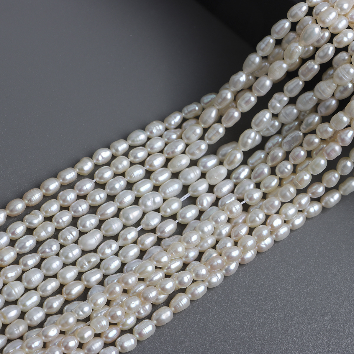 天然白色4-5mm异形米珠 一条