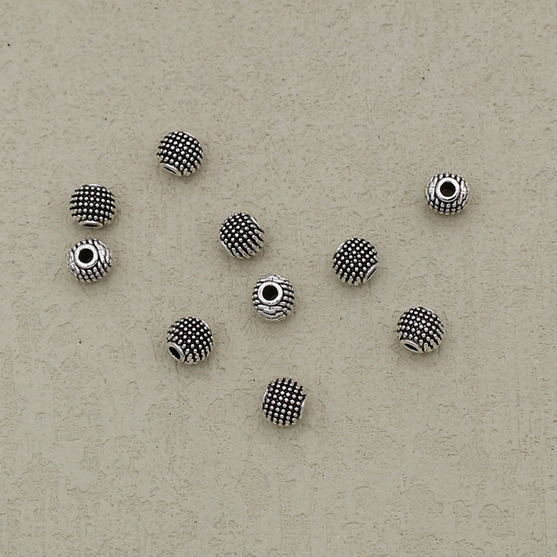 Ancient silver 8.5x8mm hole 2mm