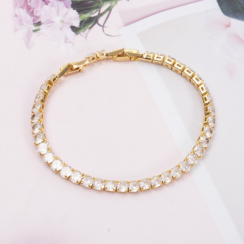1:16# bracelet gold-white zirconium
