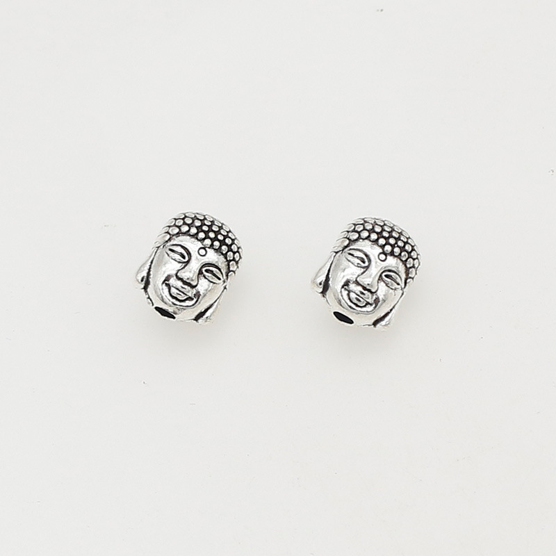 4 Ancient silver 10x9mm hole 2mm