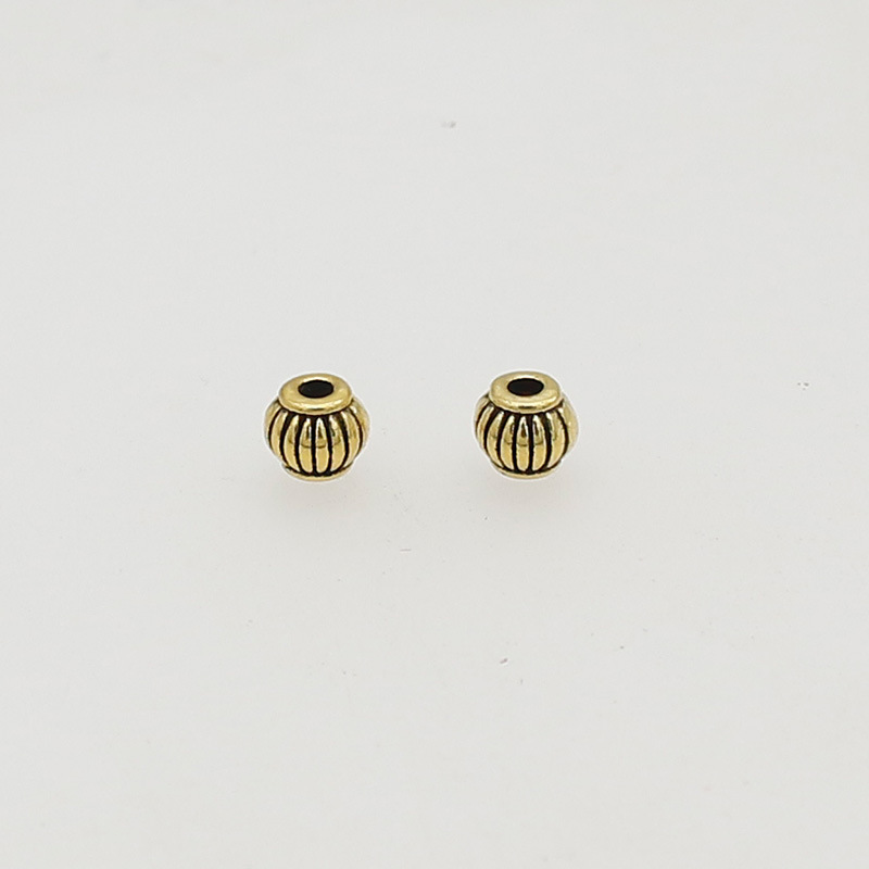 22:11 Ancient Gold 5x4mm hole 1.3mm